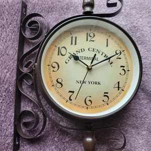 Double sided wall clock